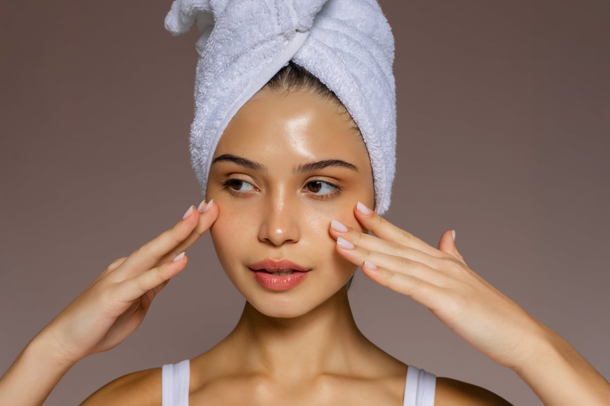 Young woman with a fresh, well-cared-for complexion after a professional facial treatment